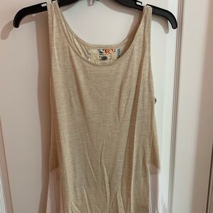 Light beige tank top with white design
